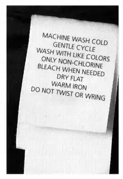 MACHINE WASH COLD GENTLE CYCLE WASH MITH LIKE COLORS BLEACH OMY NON-CHLORINE DRY FLAT DO NOT TWIST OR WRING WARM IRON