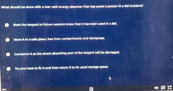 What should be done with a tear web energy absorber that has saved a person in a fall incident? Mark the lanyard so future